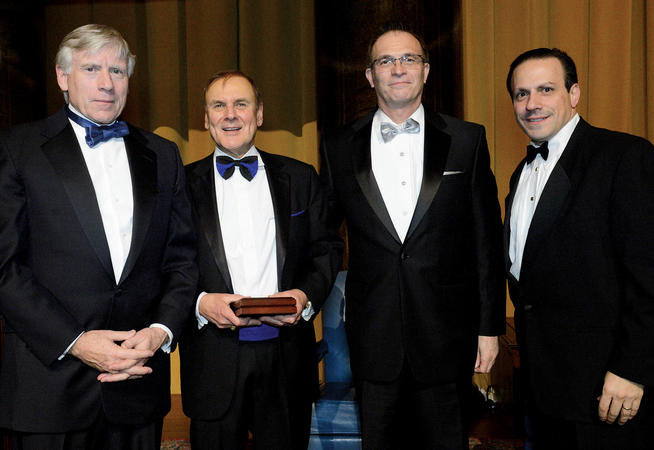 Phillip M. Satow ’63 (second from left) was honored with the 2014 Alexander Hamilton Medal on November 20. Presenting the medal were (left to right) President Lee C. Bollinger, Dean James J. Valentini and CCAA President Douglas R. Wolf ’88. 